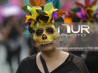 Participants take part in the 2024 Annual Day of the Dead Mega Parade on Reforma Avenue, with a route from Chapultepec to the main square Zo...