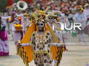 Participants take part in the 2024 Annual Day of the Dead Mega Parade on Reforma Avenue, with a route from Chapultepec to the main square Zo...