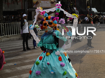 Participants take part in the 2024 Annual Day of the Dead Mega Parade on Reforma Avenue, with a route from Chapultepec to the main square Zo...