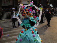 Participants take part in the 2024 Annual Day of the Dead Mega Parade on Reforma Avenue, with a route from Chapultepec to the main square Zo...