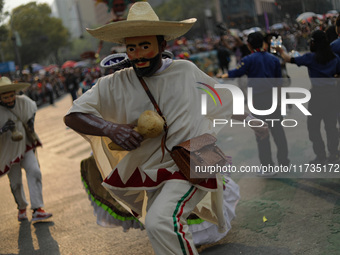 Participants take part in the 2024 Annual Day of the Dead Mega Parade on Reforma Avenue, with a route from Chapultepec to the main square Zo...