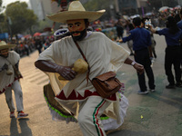 Participants take part in the 2024 Annual Day of the Dead Mega Parade on Reforma Avenue, with a route from Chapultepec to the main square Zo...