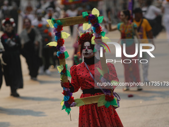 Participants take part in the 2024 Annual Day of the Dead Mega Parade on Reforma Avenue, with a route from Chapultepec to the main square Zo...