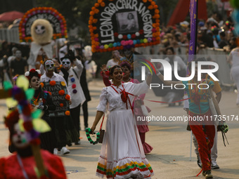 Participants take part in the 2024 Annual Day of the Dead Mega Parade on Reforma Avenue, with a route from Chapultepec to the main square Zo...