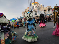 Participants take part in the 2024 Annual Day of the Dead Mega Parade on Reforma Avenue, with a route from Chapultepec to the main square Zo...