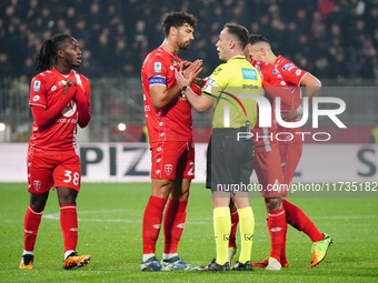 Pablo Mari and the AC Monza team protest against referee Ermanno Feliciani for the disallowance of the goal during the Italian championship...