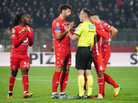 Pablo Mari and the AC Monza team protest against referee Ermanno Feliciani for the disallowance of the goal during the Italian championship...