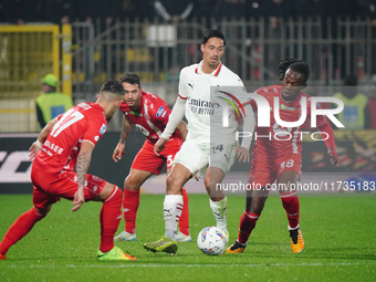 Tijjani Reijnders (AC Milan) and Warren Bondo (AC Monza) participate in the Italian championship Serie A football match between AC Monza and...