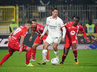 Tijjani Reijnders (AC Milan) and Warren Bondo (AC Monza) participate in the Italian championship Serie A football match between AC Monza and...