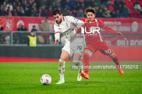 Theo Hernandez (AC Milan) and Samuele Vignato (AC Monza) participate in the Italian championship Serie A football match between AC Monza and...