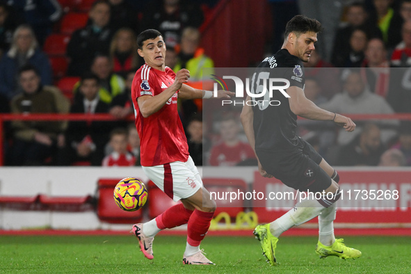 Ramon Sosa of Nottingham Forest and Konstantinos Mavropanos of West Ham United participate in the Premier League match between Nottingham Fo...