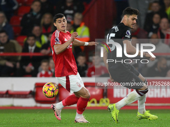 Ramon Sosa of Nottingham Forest and Konstantinos Mavropanos of West Ham United participate in the Premier League match between Nottingham Fo...