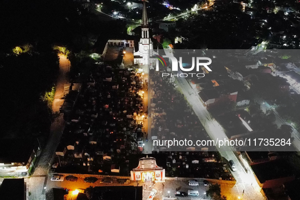 People participate in the Annual Day of the Dead Catrinas Parade at the Sanctuary of Guadalupe as part of the Mexican Dia de Muertos celebra...