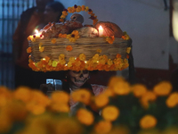 A person takes part in the Annual Day of the Dead Catrinas Parade at the Sanctuary of Guadalupe as part of Mexican Dia de Muertos celebratio...