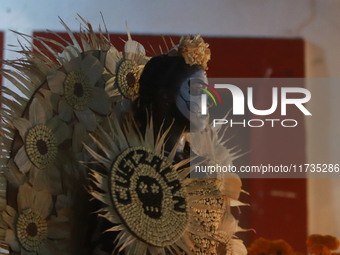 A person takes part in the Annual Day of the Dead Catrinas Parade at the Sanctuary of Guadalupe as part of Mexican Dia de Muertos celebratio...