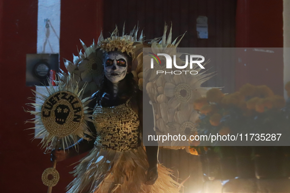 A person takes part in the Annual Day of the Dead Catrinas Parade at the Sanctuary of Guadalupe as part of Mexican Dia de Muertos celebratio...