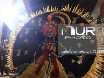 A person takes part in the Annual Day of the Dead Catrinas Parade at the Sanctuary of Guadalupe as part of Mexican Dia de Muertos celebratio...