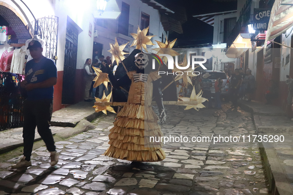 A person takes part in the Annual Day of the Dead Catrinas Parade at the Sanctuary of Guadalupe as part of Mexican Dia de Muertos celebratio...