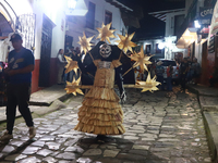 A person takes part in the Annual Day of the Dead Catrinas Parade at the Sanctuary of Guadalupe as part of Mexican Dia de Muertos celebratio...