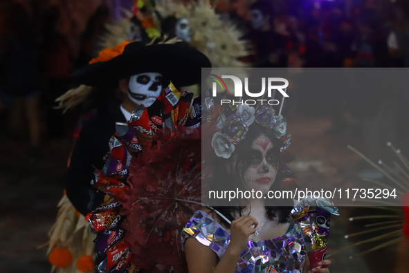 A person takes part in the Annual Day of the Dead Catrinas Parade at the Sanctuary of Guadalupe as part of Mexican Dia de Muertos celebratio...