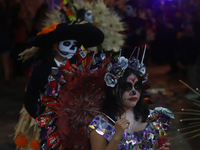 A person takes part in the Annual Day of the Dead Catrinas Parade at the Sanctuary of Guadalupe as part of Mexican Dia de Muertos celebratio...