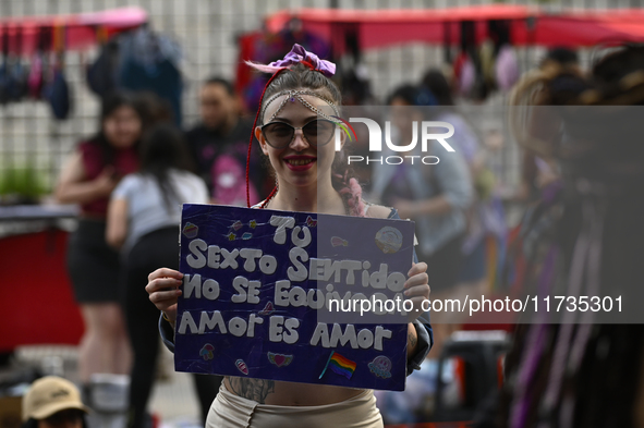 Revelers take part in the 33rd LGBT Pride Parade in Buenos Aires, Argentina, on November 2, 2024. 