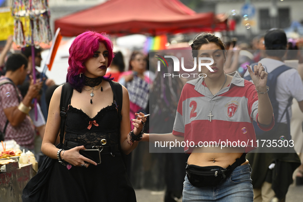 Revelers take part in the 33rd LGBT Pride Parade in Buenos Aires, Argentina, on November 2, 2024. 