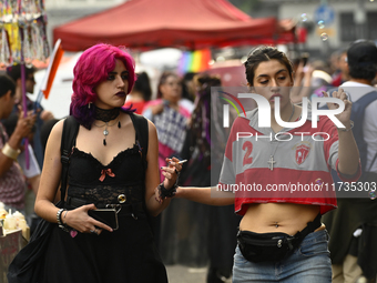 Revelers take part in the 33rd LGBT Pride Parade in Buenos Aires, Argentina, on November 2, 2024. (