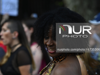 Revelers take part in the 33rd LGBT Pride Parade in Buenos Aires, Argentina, on November 2, 2024. (