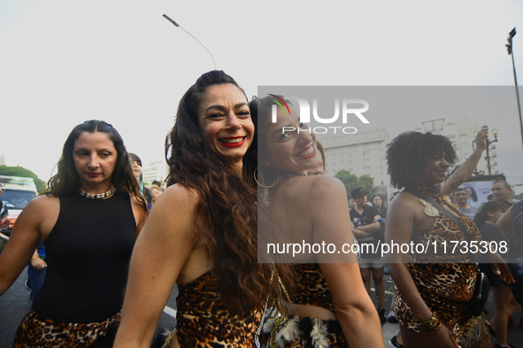 Revelers take part in the 33rd LGBT Pride Parade in Buenos Aires, Argentina, on November 2, 2024. 