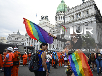 Revelers take part in the 33rd LGBT Pride Parade in Buenos Aires, Argentina, on November 2, 2024. (