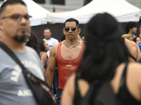 Revelers take part in the 33rd LGBT Pride Parade in Buenos Aires, Argentina, on November 2, 2024. (