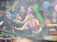 Revelers take part in the 33rd LGBT Pride Parade in Buenos Aires, Argentina, on November 2, 2024. (