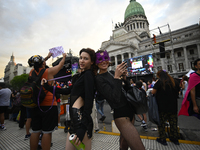 Revelers take part in the 33rd LGBT Pride Parade in Buenos Aires, Argentina, on November 2, 2024. (