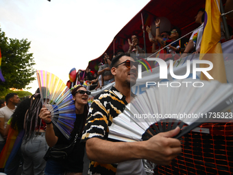 Revelers take part in the 33rd LGBT Pride Parade in Buenos Aires, Argentina, on November 2, 2024. (