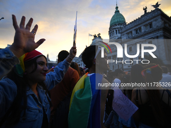 Revelers take part in the 33rd LGBT Pride Parade in Buenos Aires, Argentina, on November 2, 2024. (