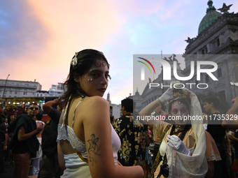 Revelers take part in the 33rd LGBT Pride Parade in Buenos Aires, Argentina, on November 2, 2024. (