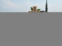 People decorate the graves of their loved ones with cempasuchil flowers at the Municipal Cemetery of San Juan del Rio. Mexicans visit the ce...