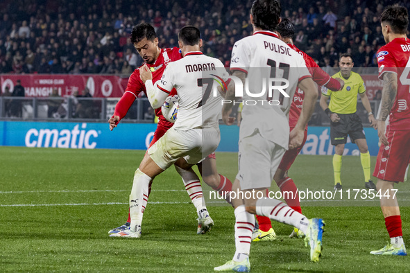 Alvaro Morata and Andrea Carboni are in action during the Serie A match between AC Monza and AC Milan at U-Power Stadium in Monza, Italy, on...