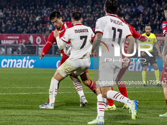 Alvaro Morata and Andrea Carboni are in action during the Serie A match between AC Monza and AC Milan at U-Power Stadium in Monza, Italy, on...