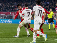 Alvaro Morata and Andrea Carboni are in action during the Serie A match between AC Monza and AC Milan at U-Power Stadium in Monza, Italy, on...