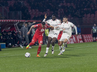 Dany Mota, Youssouf Fofana, and Alvaro Morata are in action during the Serie A match between AC Monza and AC Milan at U-Power Stadium in Mon...