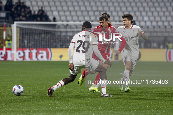 Youssouf Fofana and Daniel Maldini play during the Serie A match between AC Monza and AC Milan at U-Power Stadium in Monza, Italy, on Novemb...