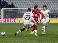 Youssouf Fofana and Daniel Maldini play during the Serie A match between AC Monza and AC Milan at U-Power Stadium in Monza, Italy, on Novemb...