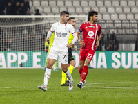 Alvaro Morata and Pablo Mari are in action during the Serie A match between AC Monza and AC Milan at U-Power Stadium in Monza, Italy, on Nov...