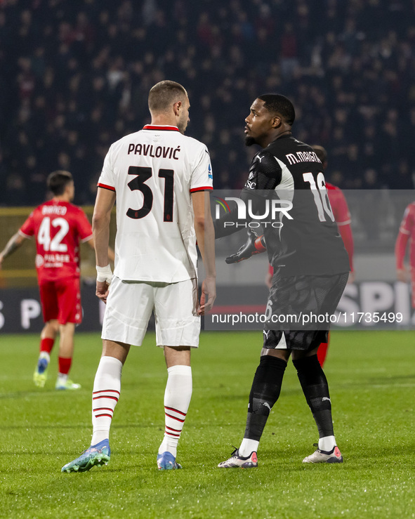 Strahinja Pavlovic and Mike Maignan are in action during the Serie A match between AC Monza and AC Milan at U-Power Stadium in Monza, Italy,...