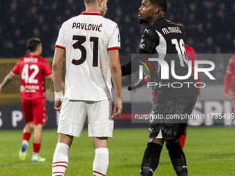 Strahinja Pavlovic and Mike Maignan are in action during the Serie A match between AC Monza and AC Milan at U-Power Stadium in Monza, Italy,...