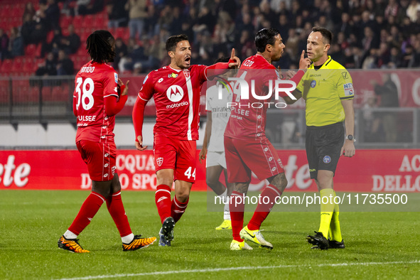 Andrea Carboni and Armando Izzo are in action during the Serie A match between AC Monza and AC Milan at U-Power Stadium in Monza, Italy, on...