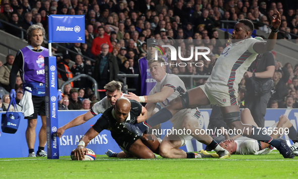 Mark Tele'a of New Zealand scores the winning try during the Autumn Nations Series International Rugby match between England and New Zealand...