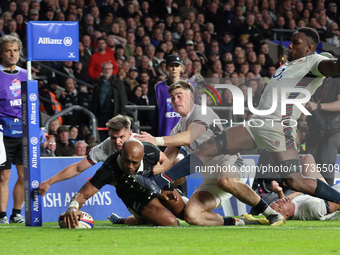 Mark Tele'a of New Zealand scores the winning try during the Autumn Nations Series International Rugby match between England and New Zealand...